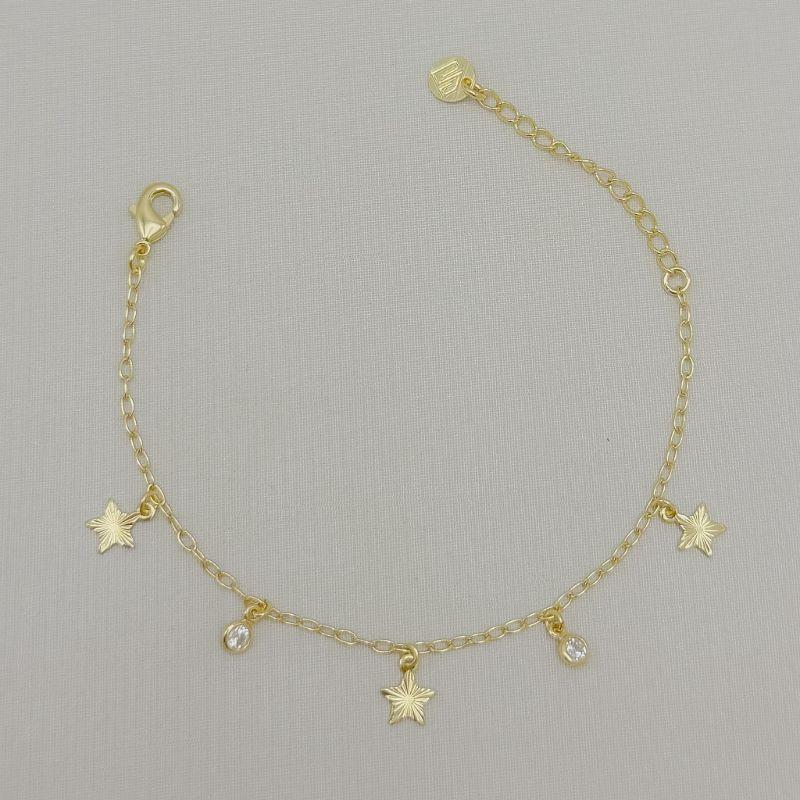 12.2366.1.O - Pulseira de elos americanos com múltiplos pingentes de estrelas e ponto de luz