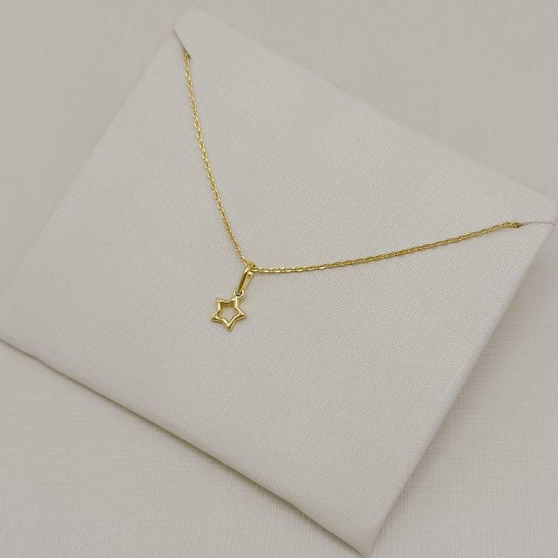 09.2553.0.O - (45) Colar de elos cartier com pingente de silhueta de estrela lisa