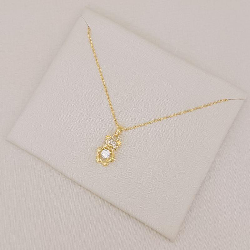 09.2583.1.O - (45) Colar de cartier com pingente de urisnho com ponto de luz central e parte cravejada
