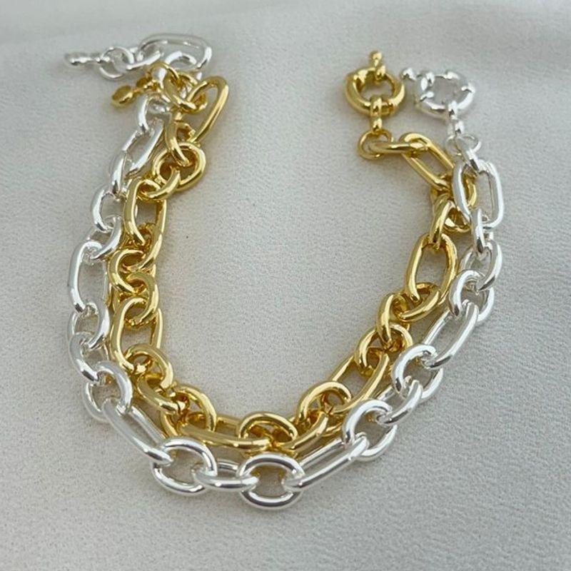 12.1938.0.O - Pulseira de elos figaro tres/tres em tubo liso