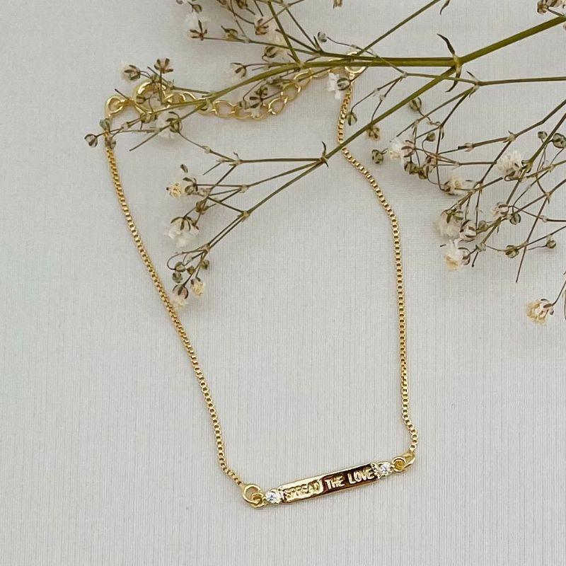 12.2085.0.O - Pulseira de veneziana com placa central de escrita SPREAD THE LOVE