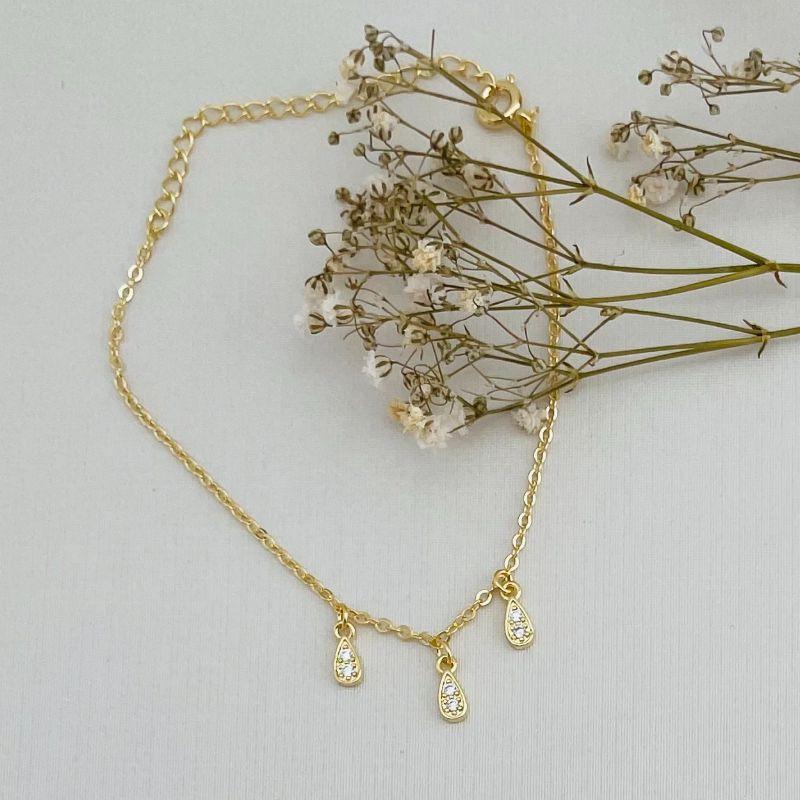12.2086.1.O - Pulseira de elos ovais com tres pingentes em gota cravejadas com borda