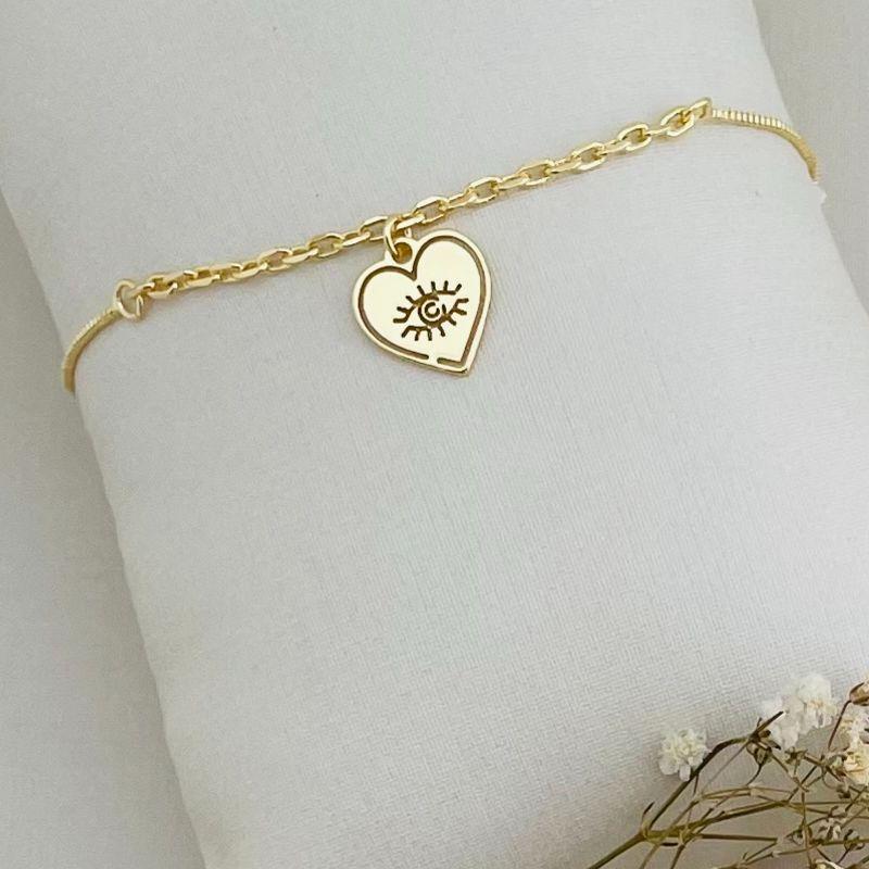 12.2089.0.O - Pulseira de veneziana com meio de tijolinho com pingente placa coração com olho