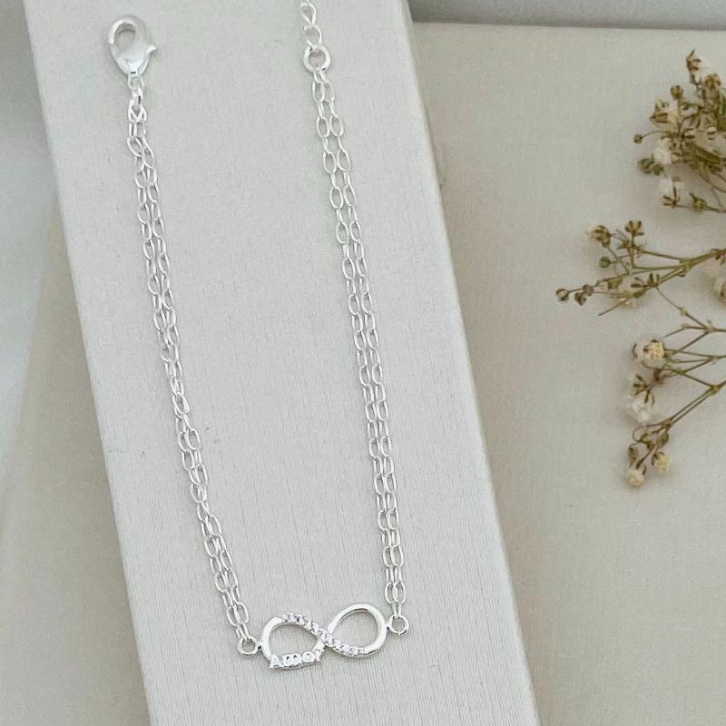 12.2097.1.S - Pulseira dupla com meio em infinito cravejado e escrita AMOR