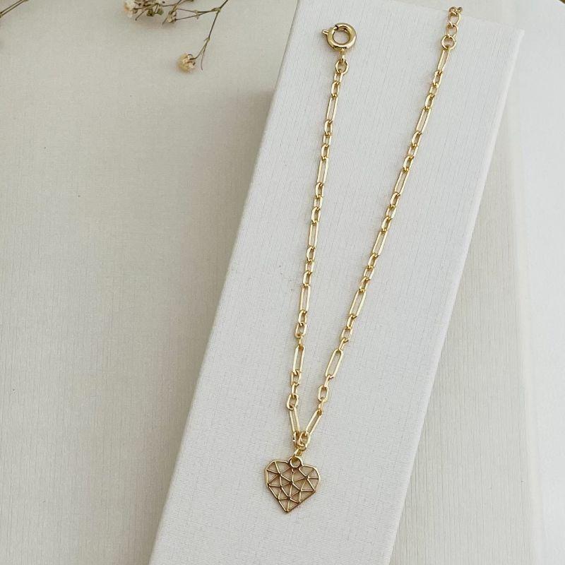 12.2109.0.O - Pulseira de elos ovais em formato figaro com pingente diamante liso
