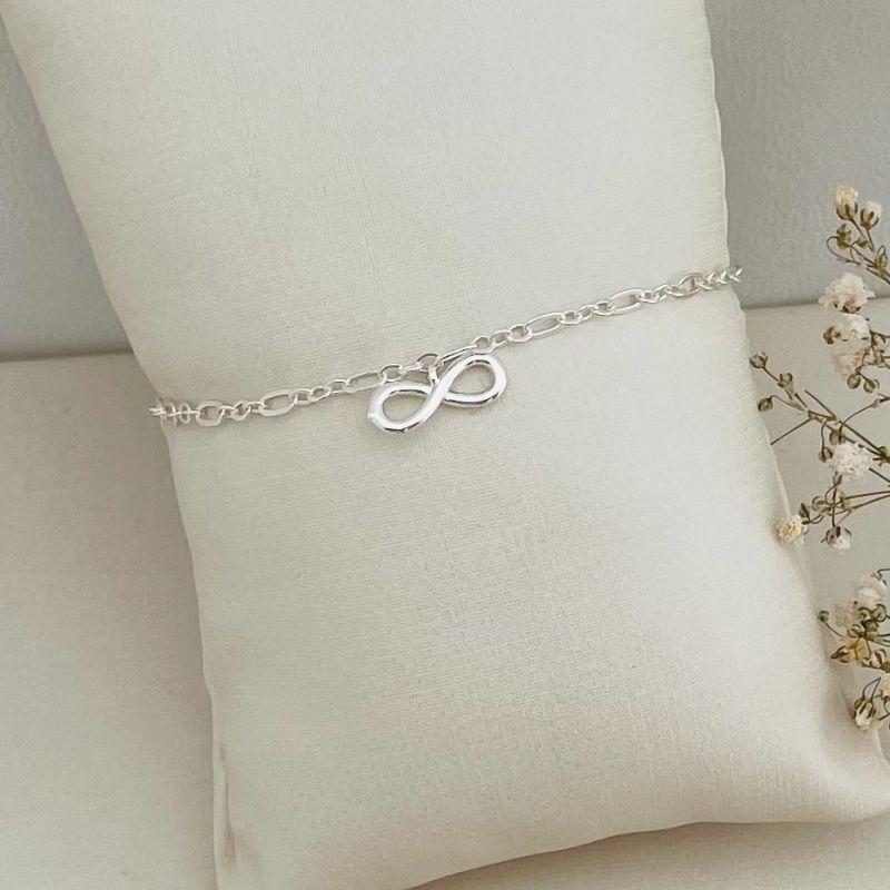 12.2110.0.S - Pulseira de elos ovais em forma figaro com pingente de infinito liso