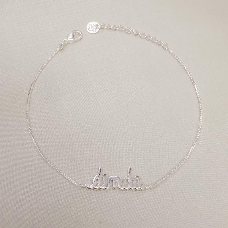12.2311.0.S - Pulseira de veneziana com escrita dinda central lisa