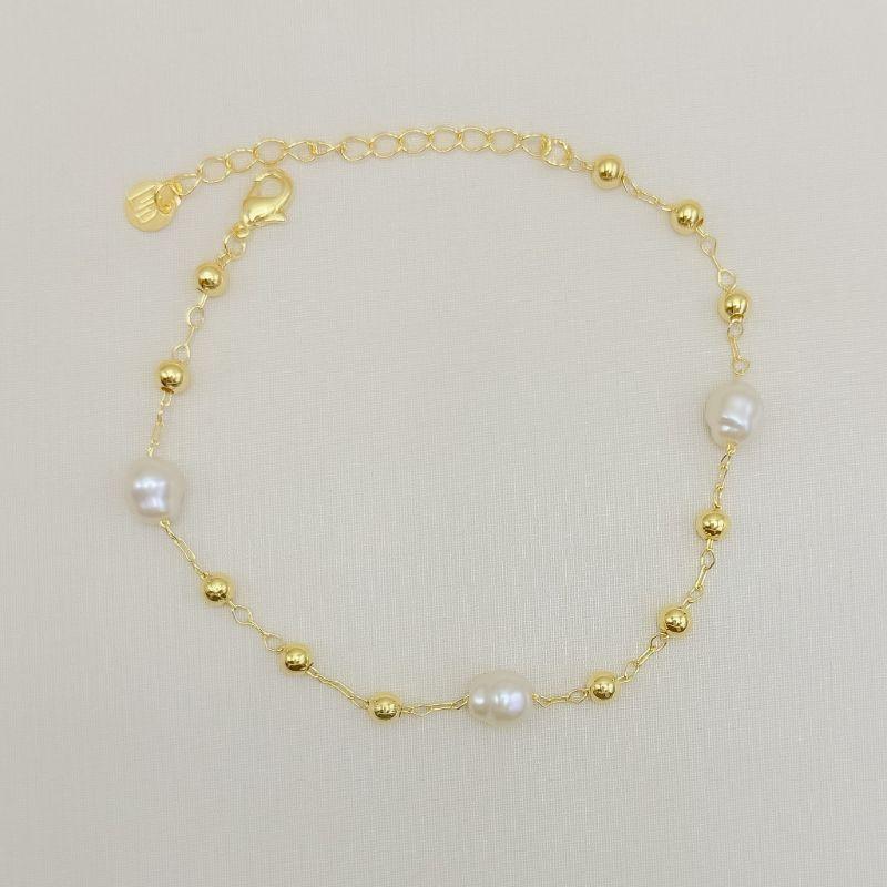 12.2374.15.O - Pulseira de três bolinhas lisas com uma pérola de rio intercaladas