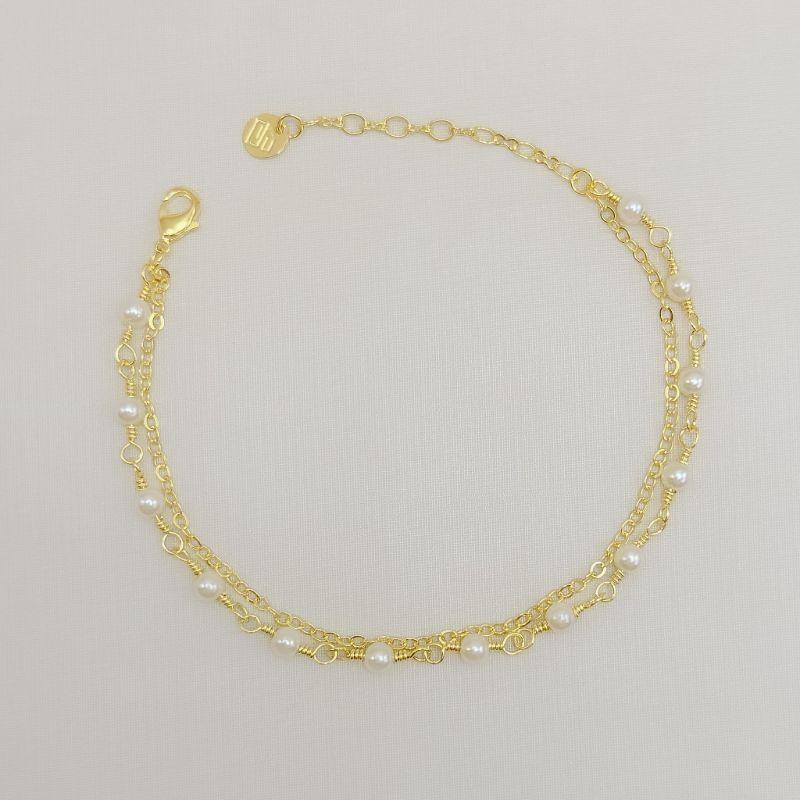 12.2375.15.O - Pulseira de dupla  de elos americanos e outra de pérolas em arame
