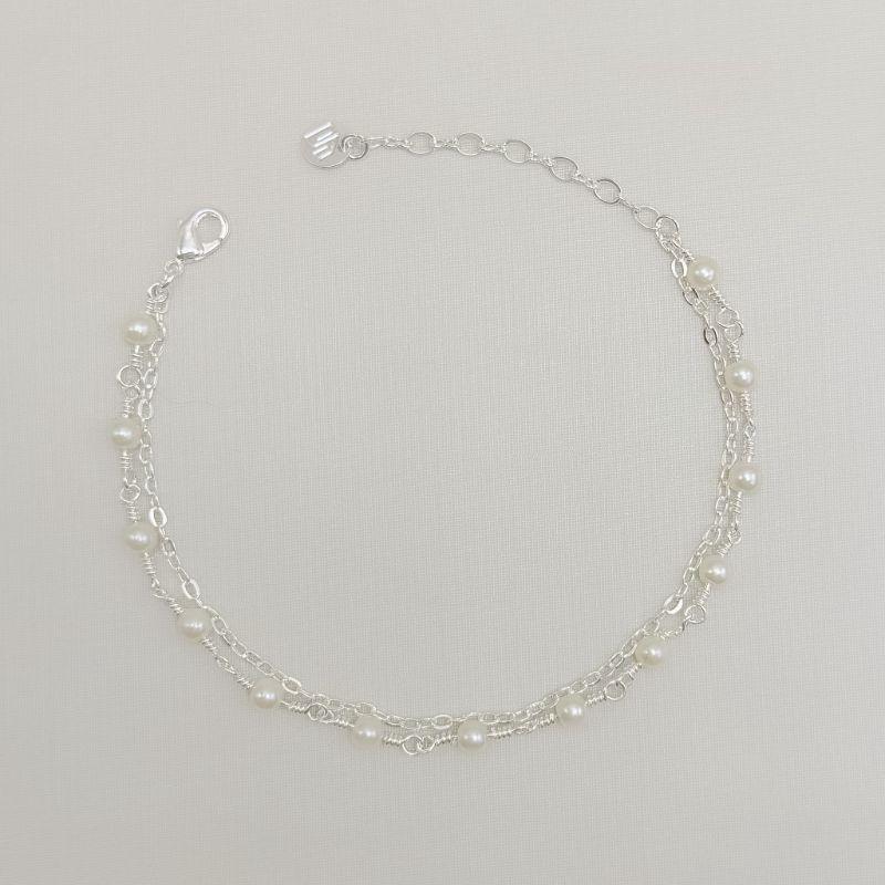 12.2375.15.S - Pulseira de dupla  de elos americanos e outra de pérolas em arame