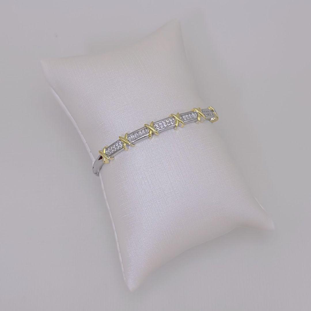 04.0220.1.B - Bracelete de seis X em banho dourado intercalado com barras de cravação