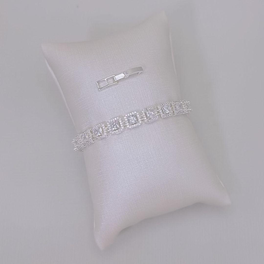 12.2384.1.S - Pulseira estilo riviera em pedras carrê com uma linha de aura articulada