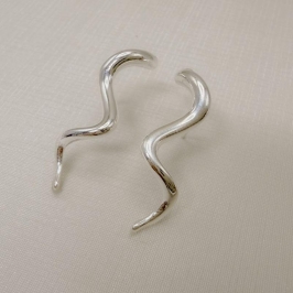 06.1314.0.S - Brinco cachos lisos.