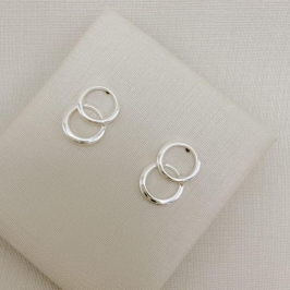 07.2813.0.S - Brinco dois círculos silhueta lisa.