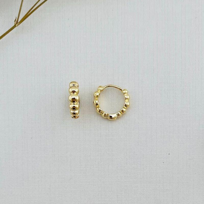 05.2852.0.O - Argola de tubo em cinco bolas lisas ovaladas