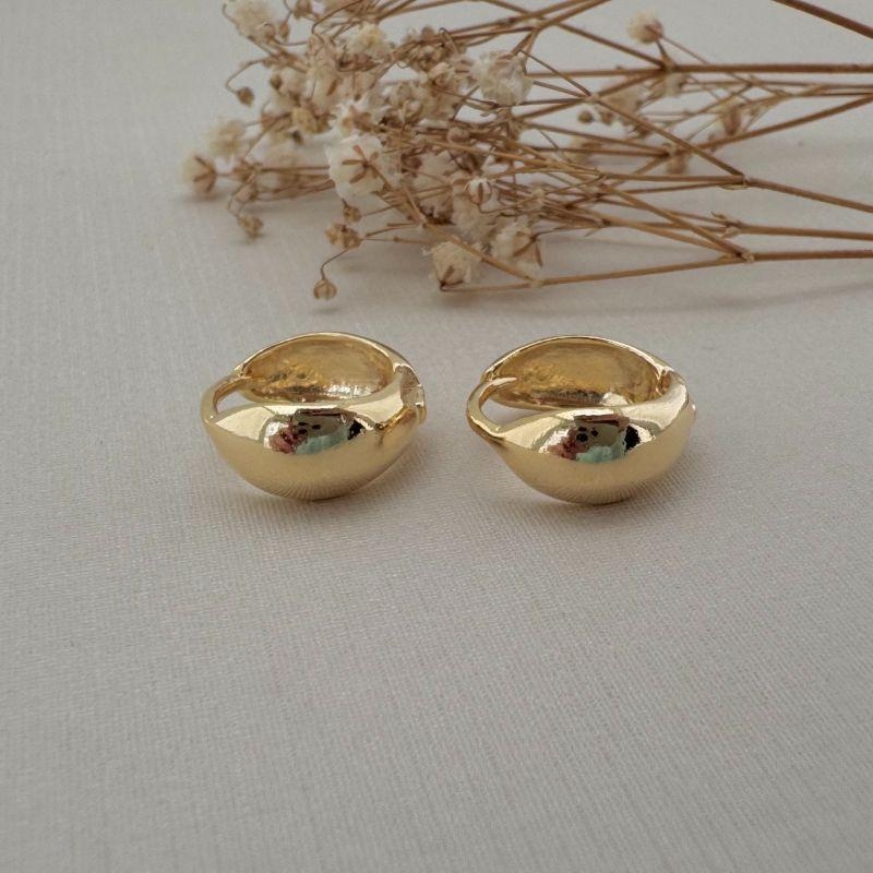 05.2981.0.O - (Tam. G) Argola de formato abaloado frente e costa lisa