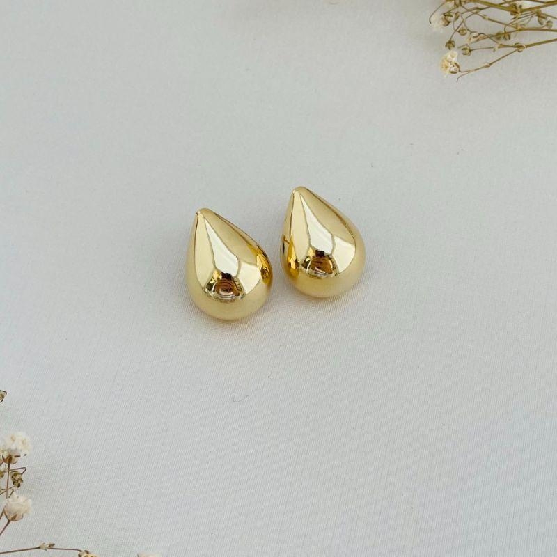 06.1799.0.O - Brinco de formato gota em chapa lisa abaloada