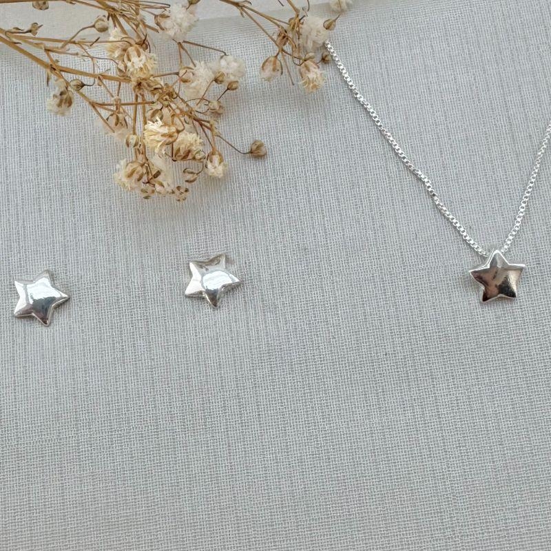 07.2679.0.S - (45) Brinco mini estrela lisa com borda reta