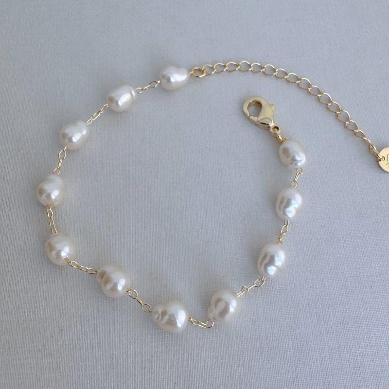 12.2197.15.O - Pulseira de pérolas irregulares separadas.