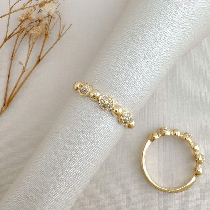 03.2473.1.O - (21) Anel de bolinhas em cravação intercalada