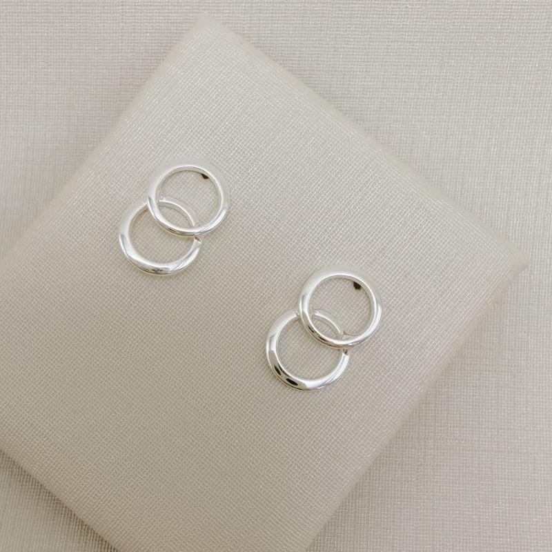 07.2813.0.S - Brinco dois círculos silhueta lisa.