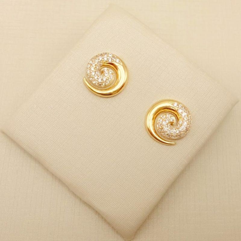 07.2844.1.O - Brinco espiral meio cravejado.