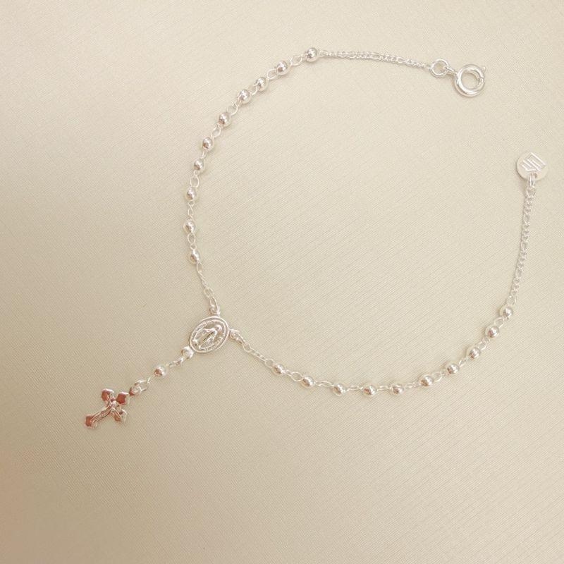 12.2254.0.S - Pulseira terço de bolinhas lisas.