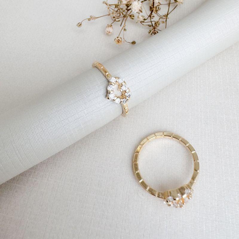 01.0210.1.O - (10) Anel falange de silhueta coração com aro em efeito barras