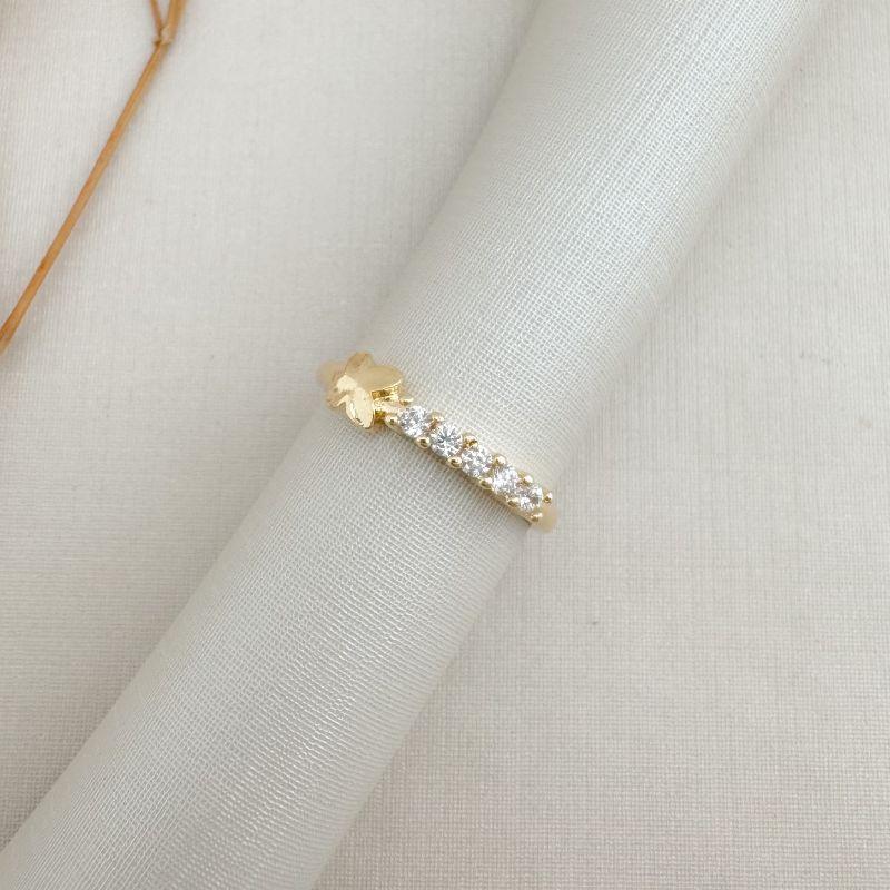 03.2435.1.O - (14) Anel de cinco zircônia com flor de Alhambra lisa