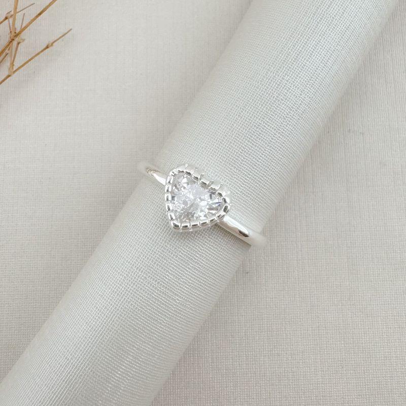 03.2436.1.S - (17) Anel de coração 8,2mm com borda em spikes e aro liso