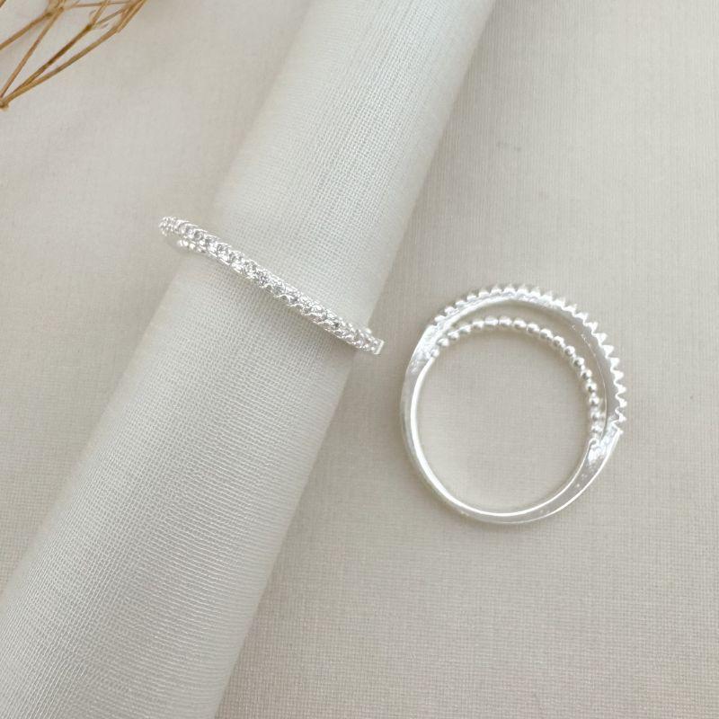 03.2439.1.S - (20) Anel de bolinhas lisas com uma linha alta cravejada por cima