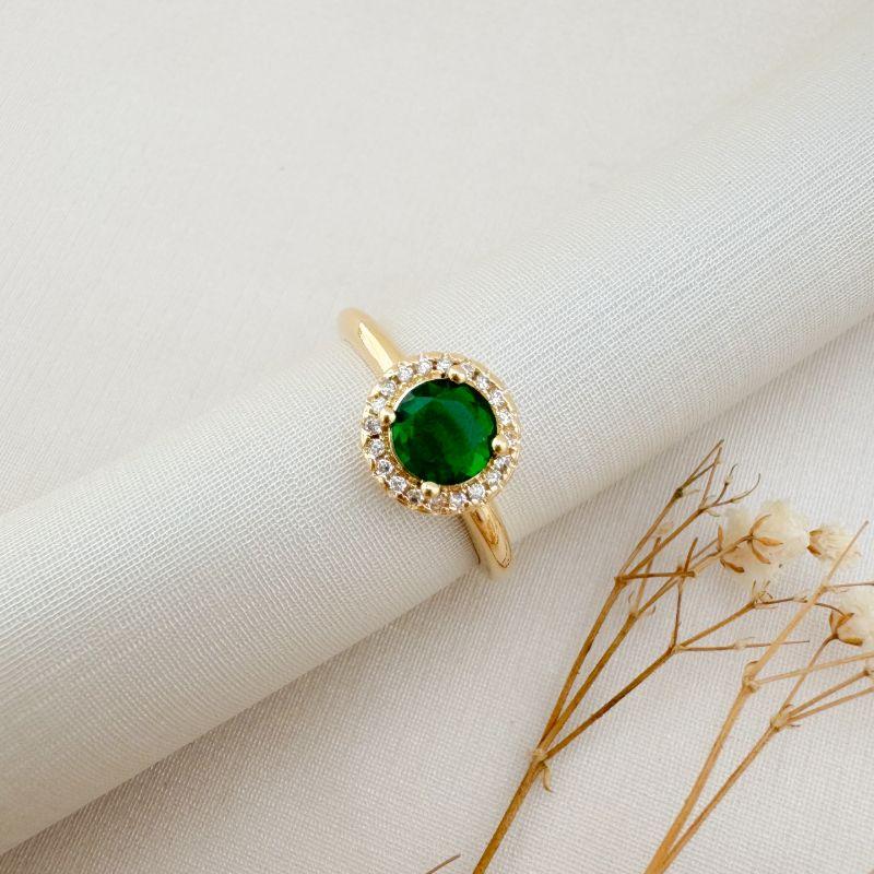 03.2442.5.O - (17) Anel solitário com uma coluna de cravação em volta