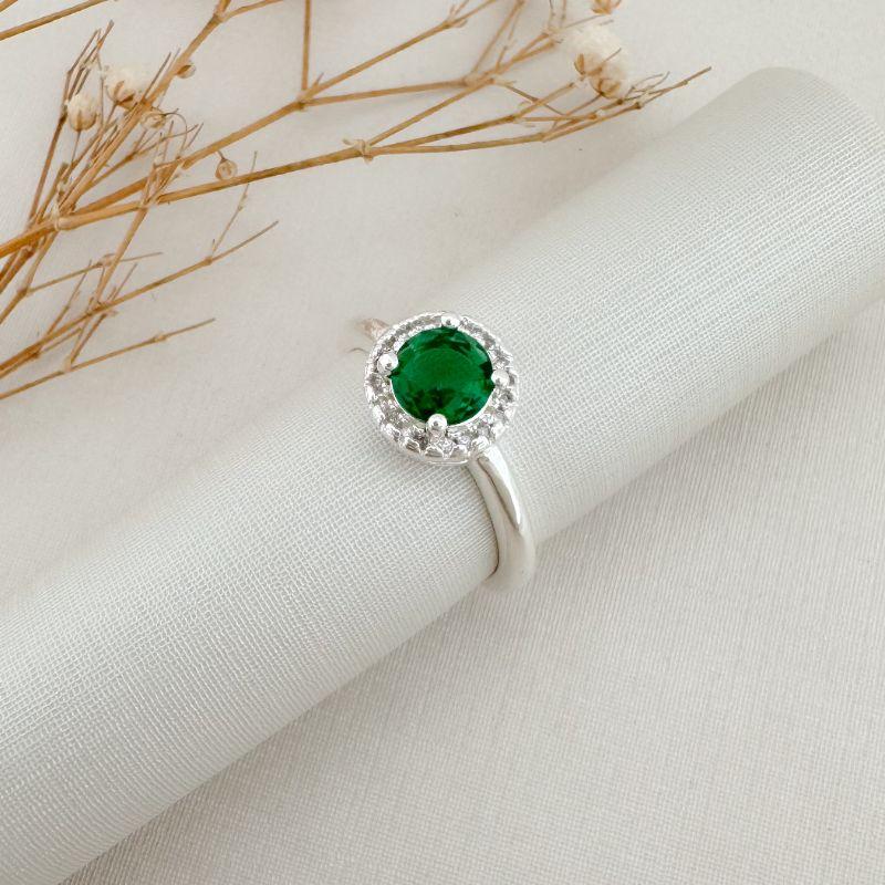 03.2442.5.S - (16) Anel solitário com uma coluna de cravação em volta