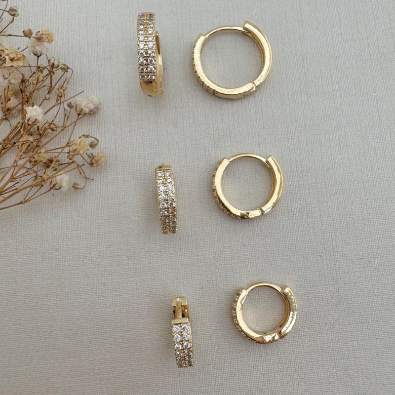 05.2940.1.O - Trio de argola de duas colunas em cravação simetrica e borda rente