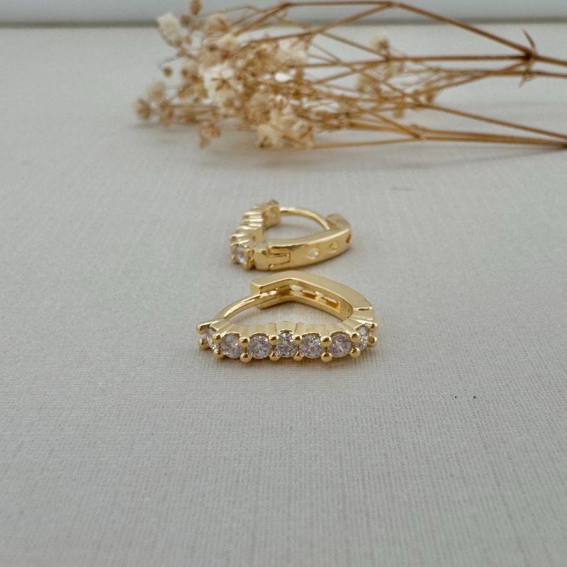 05.2958.1.O - Argola de coração cravejada tamanho M