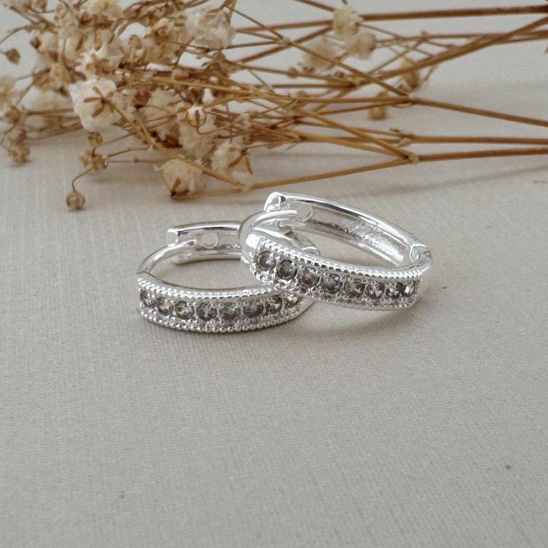 05.2976.1.S - Argola uma coluna cravejada de garras e borda larga em spike tamanho G