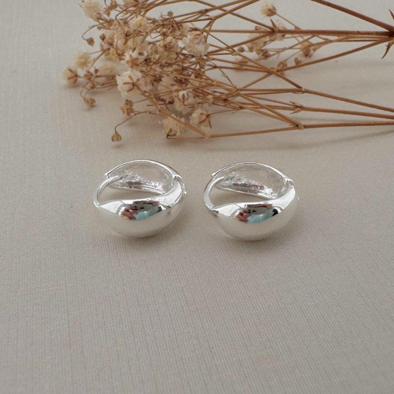 05.2981.0.S - (Tam. G) Argola de formato abaloado frente e costa lisa