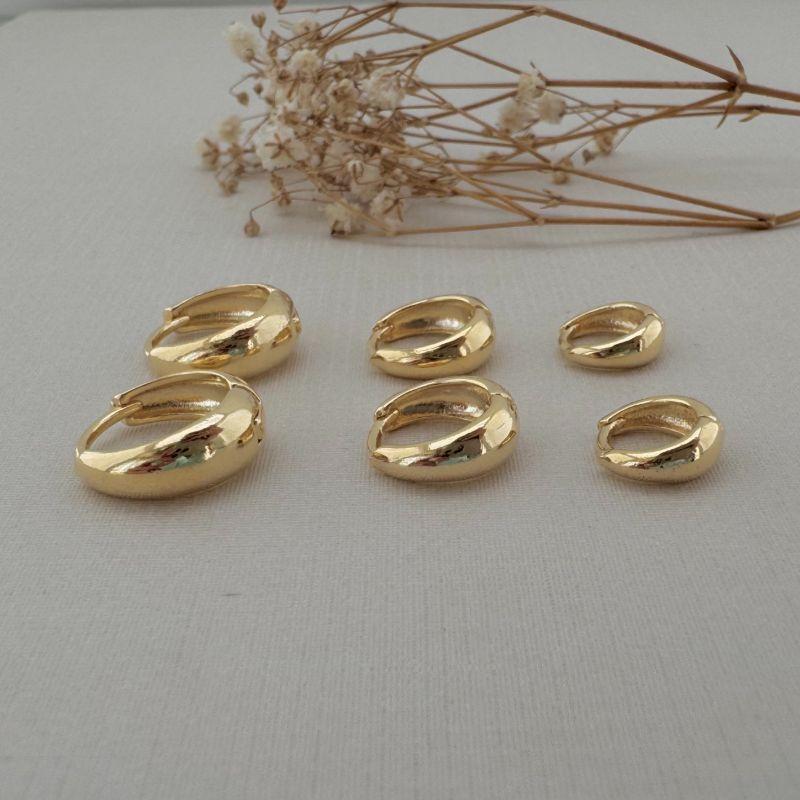 05.2993.0.O -  Trio de argolas em formato gota clássicas lisas