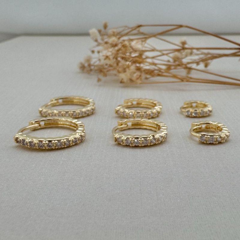 05.3007.1.O - Trio de argolas de uma coluna de cravação em técnica garras