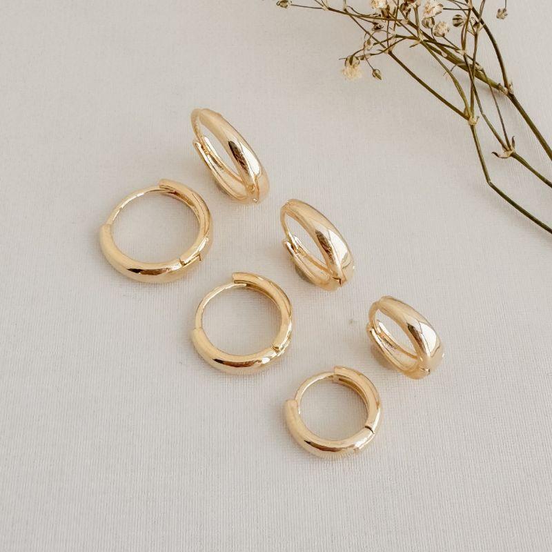 05.3027.0.O - Trio de argolas em formato gota longa lisa de borda arredondada