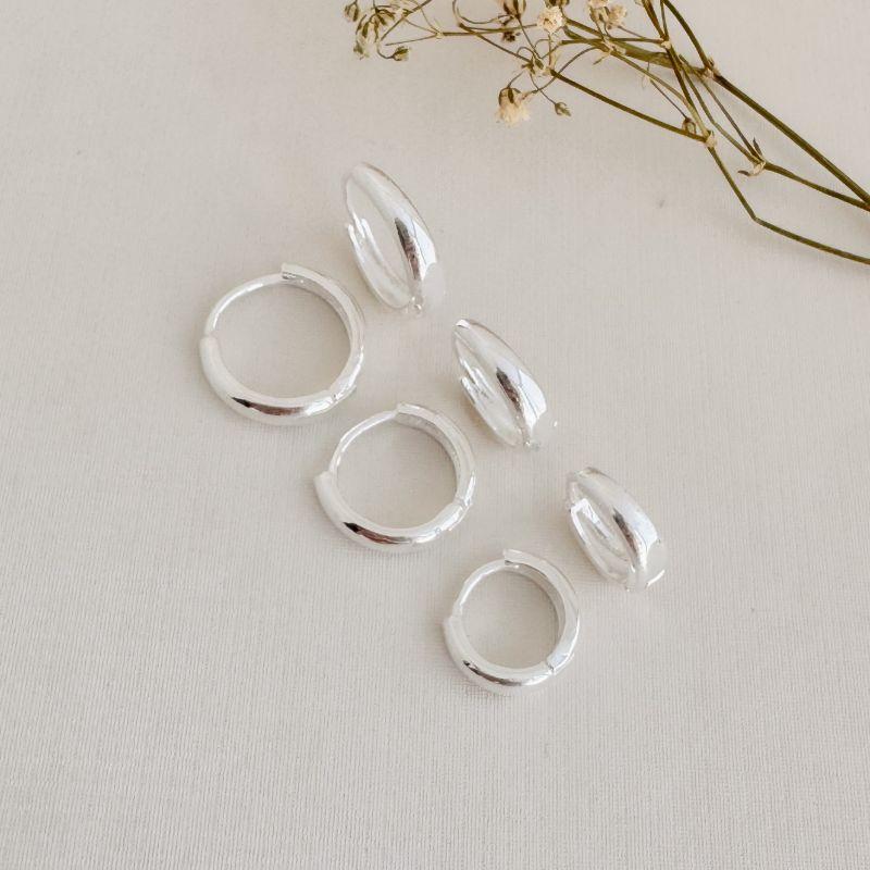 05.3027.0.S - Trio de argolas em formato gota longa lisa de borda arredondada