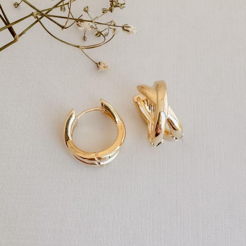 05.3037.0.O - Argola circular com tubos em formato X largo liso arredondado