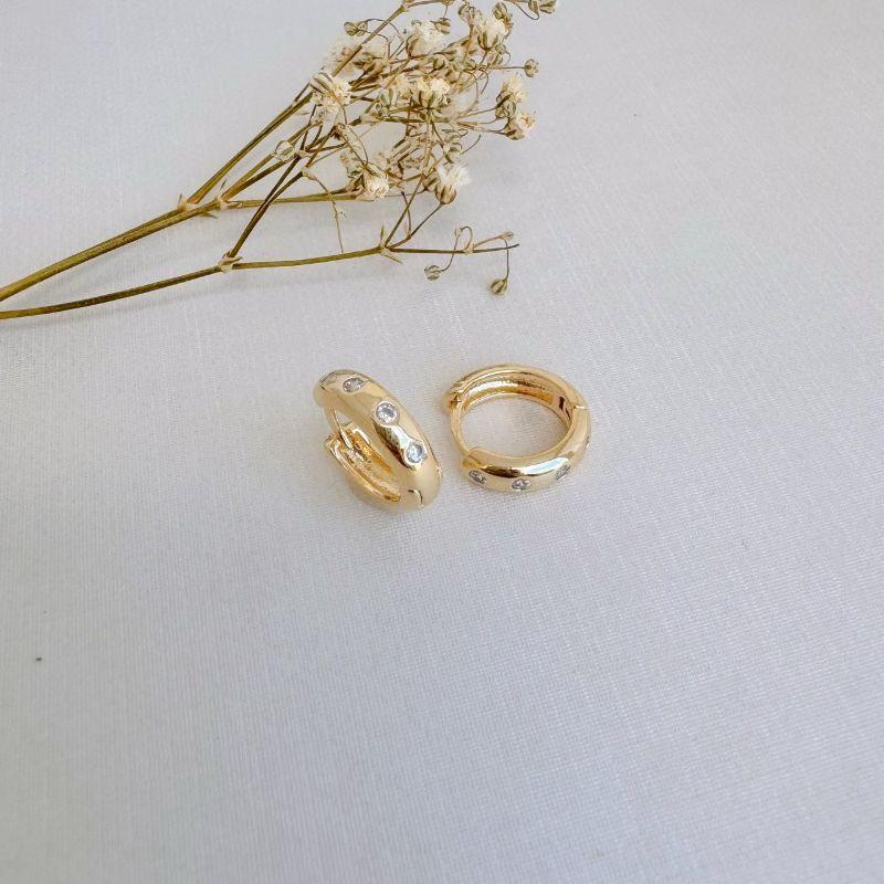 05.3044.1.O - Argola circular com quatro pontos de luz em cravação embutida