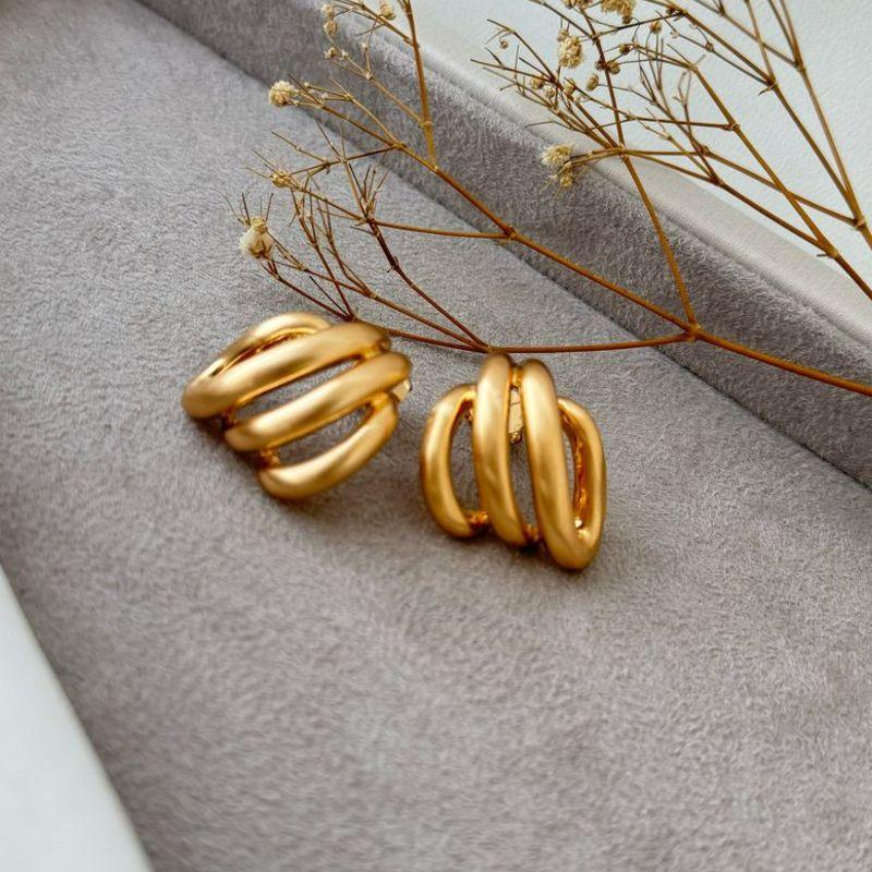 06.1765.0.O - Brinco de quatro tubos assimétricos em efeito jateado