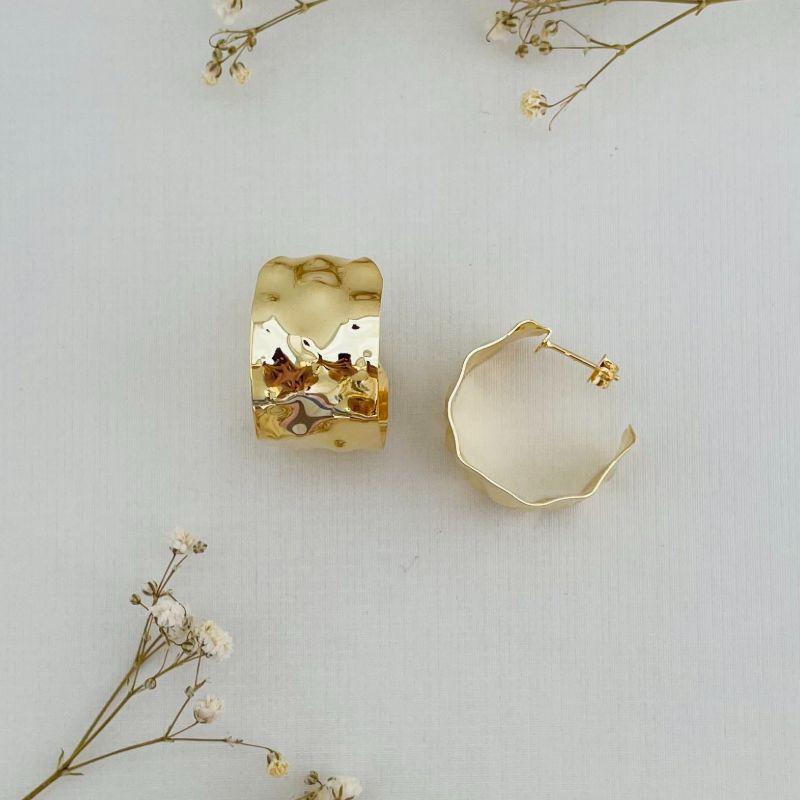 06.1797.0.O - Brinco de tarraxa em chapa circular em efeito organico