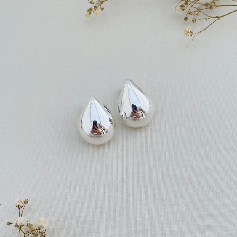 06.1799.0.S - Brinco de formato gota em chapa lisa abaloada