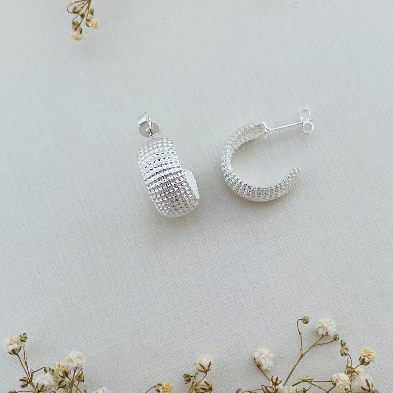 06.1804.0.S - Brinco de tarraxa em chapa circular com efeito grades