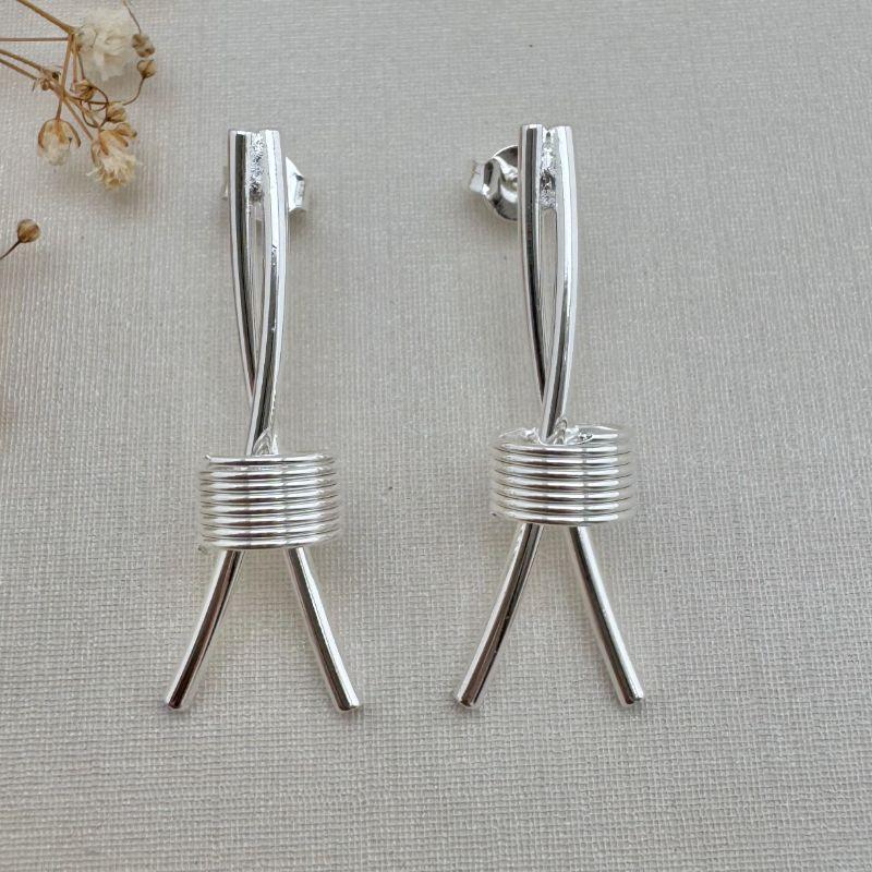 06.1823.0.S - Brinco de dois tubos longos com espiral na parte inferior