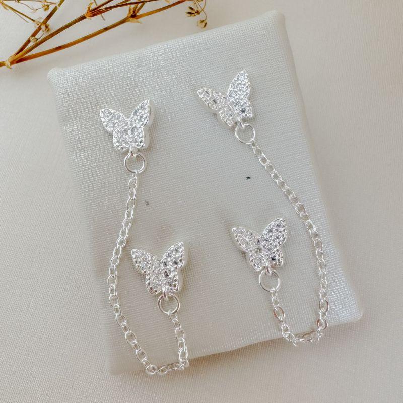 06.1863.1.S - Brinco de borboletas cravejadas conectado por elos