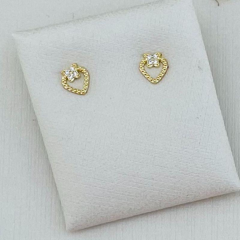 07.2279.1.O - Brinco silhueta de coração em spikes com laço cravejado